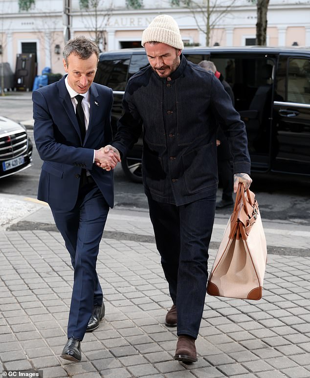 Beckham was greeted with a warm handshake from hotel staff during his appearance in Paris on Monday morning