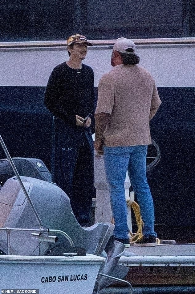 At one point during dinner, Chalamet was spotted snapping photos of Jenner with a digital camera before reviewing the images, while Jenner scrolled through her phone beside him