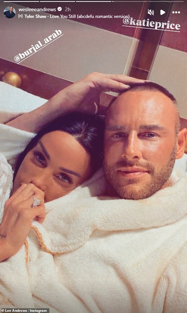 Lee shared a new photo of himself on Monday as he cuddled up to Katie, who was flaunting her engagement ring