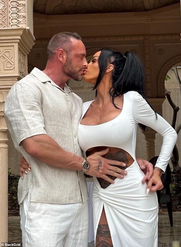 New pictures from the ceremony show Katie gazing adoringly at Lee as she shows off her assets in a skimpy cut out dress as well as her huge diamond engagement ring