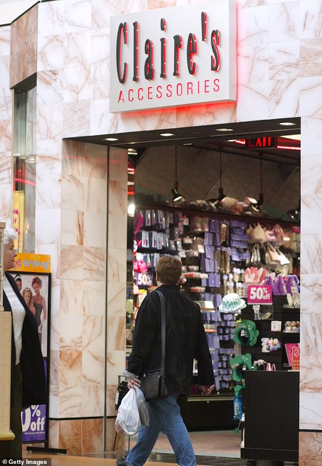 The popular accessories chain filed a notice of intention to appoint administrators in the days following Christmas (Pictured: a shopper walks past a Claire's in 2002)