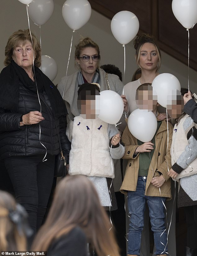 The three children of a murdered British expat joined an emotional tribute to her as her heartbroken family demanded justice for her brutal death
