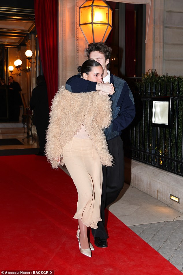 While Cruz and Jackie, 30, brushed off the drama completely as they put on a very loved-up display on their way out of their Paris hotel