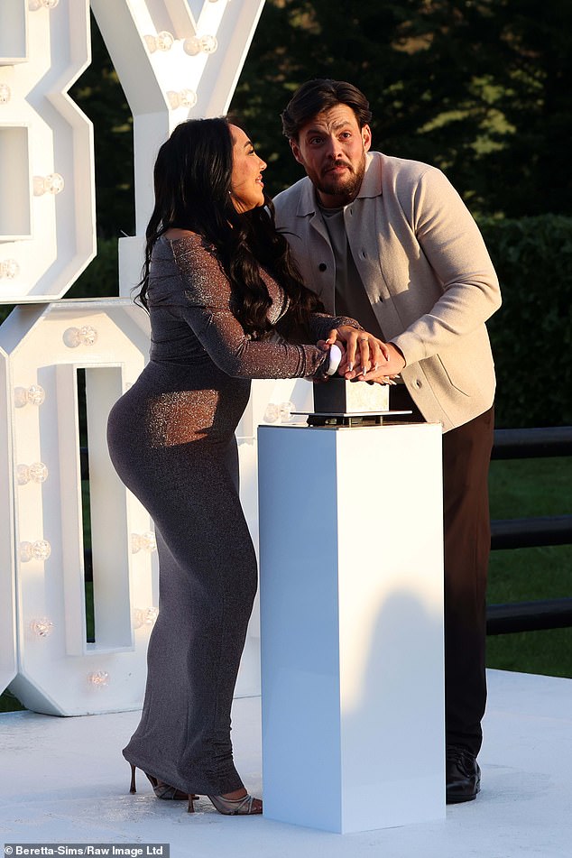 The loved-up couple looked happier than ever as they revealed they are expecting a baby boy during the show-stopping event