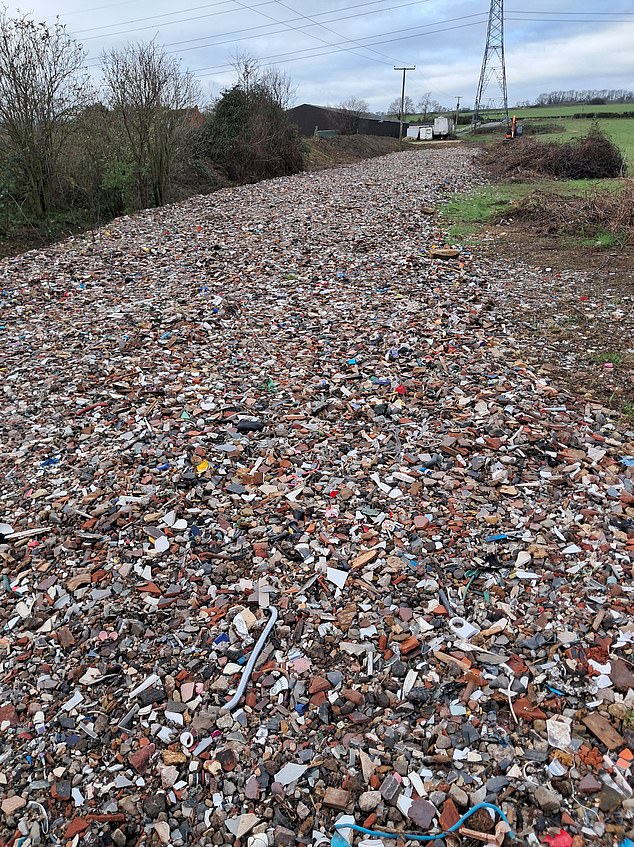 Second tip: At Evesham, a mass of processed waste - which appears to be mainly building materials - was spread into a long strip along the edge of a field