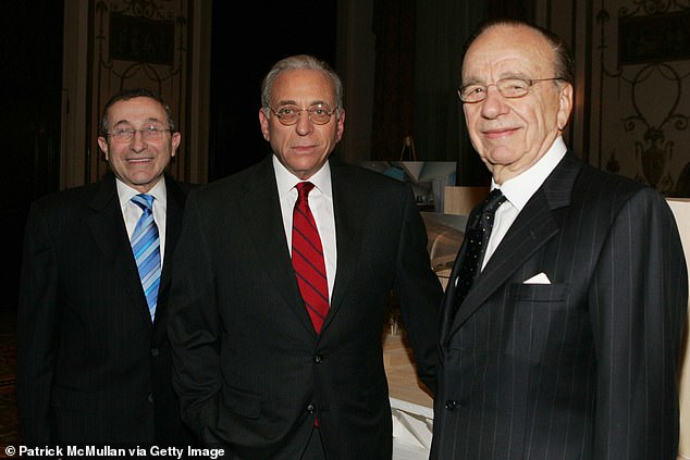 Nelson built Triangle Industries into the largest packaging company in the world (pictured with Rupert Murdoch, right, in 2006)