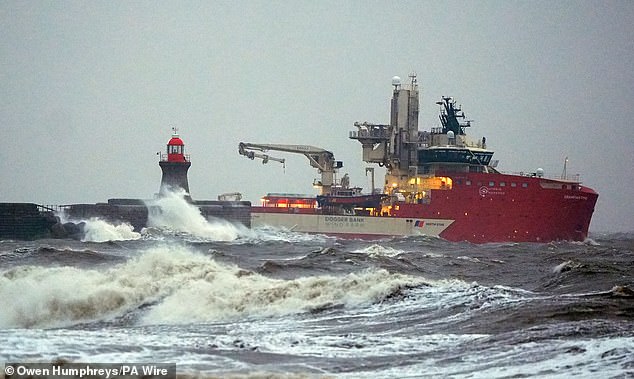The Dogger Bank wind farm vessel passes the damaged South Shields sea wall on Sunday