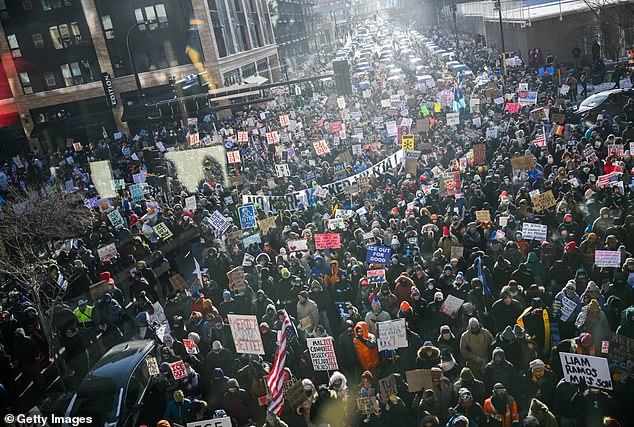 Demonstrators participate in a rally and march during an 'ICE Out' day of protest on January 23 in Minneapolis