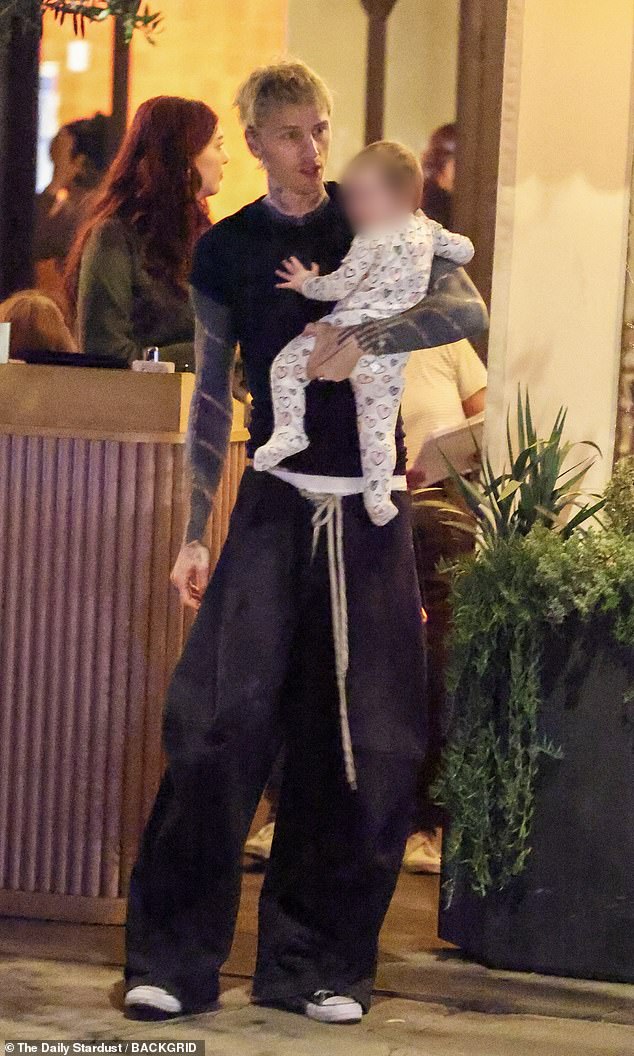 MGK, who is currently on retreat from his Lost In Americana tour, wore black and white Converse sneakers