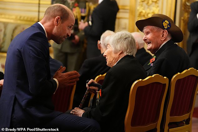 Prince William and veterans Pat Owtram and Charlie Richards at a reception for veterans who served in the Pacific during the Second World War, part of the commemorations marking the 80th anniversary of VJ Day, at Windsor Castle