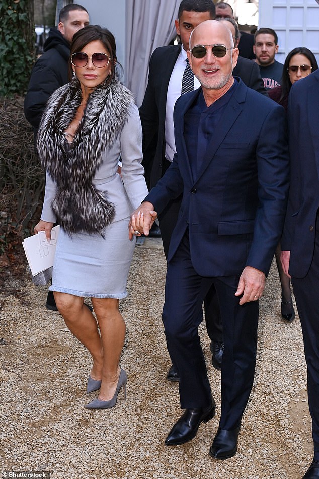 Sanchez cut a stylish figure in a pale blue skirt and matching jacket, complete with a lavish fur collar