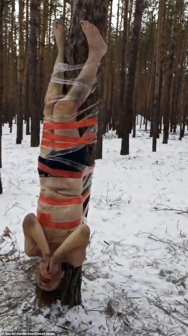 One mutinous fighter was seen taped upside down to a tree in the biting cold near the frontline