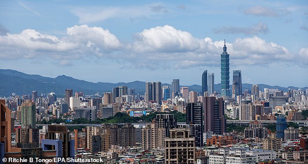 'There is no way they could pull off the Taiwan contingency with no senior leaders in charge,' expert Lyle Morris said - pictured is the city centre of capital Taipei