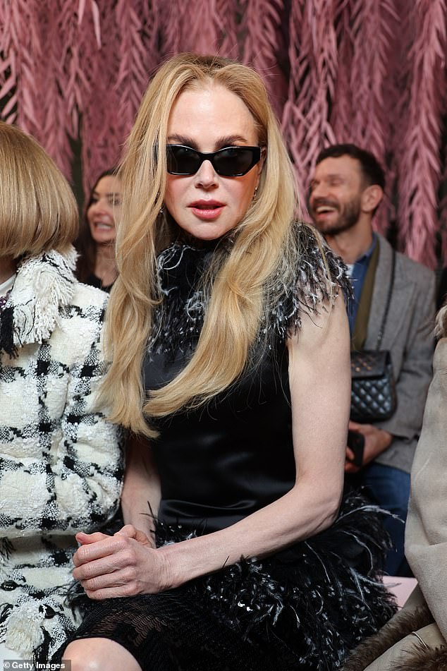 Nicole was displaying her taut visage as she posed on the FROW