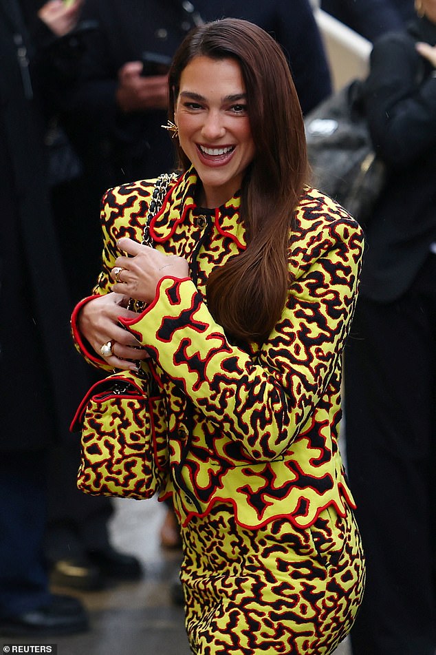 She certainly brightened up a dreary and grey Paris with her outfit