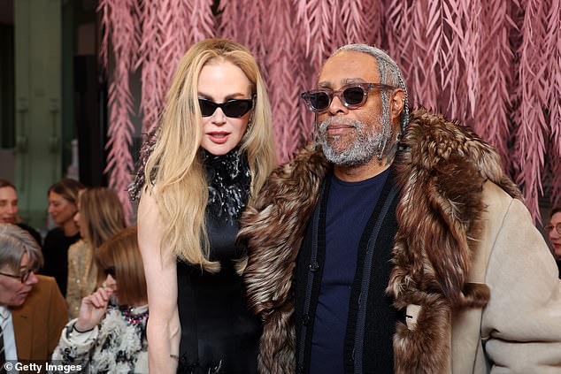 Nicole posed with artist Arthur Jafa inside the show