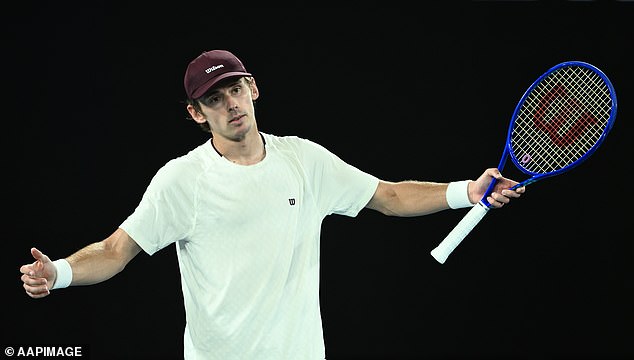 Alex de Minaur of Australia reacts during the Men's quarter final match against Carlos Alcaraz of Spain on day 10 of the 2026 Australian Open tennis tournament at Melbourne Park in Melbourne, Tuesday, January 27, 2026. (AAP Image/Joel Carrett) NO ARCHIVING