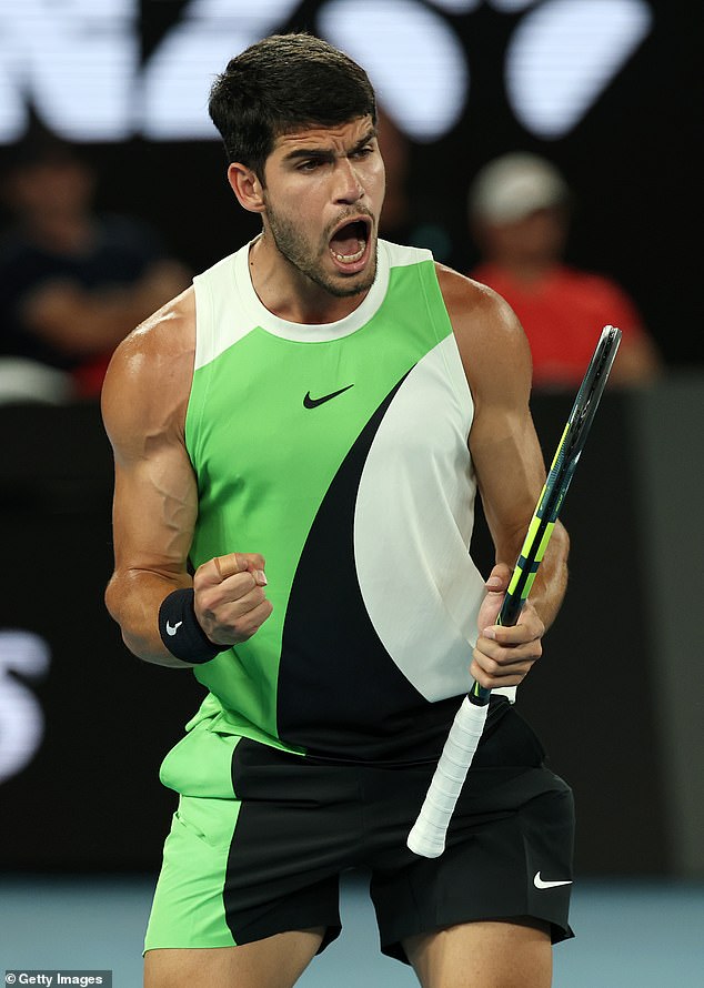 MELBOURNE, AUSTRALIA - JANUARY 27: Carlos Alcaraz of Spain celebrates a point against Alex de Minaur of Australia during the Men's Singles Quarter Final match on day 10 of the 2026 Australian Open at Melbourne Park on January 27, 2026 in Melbourne, Australia. (Photo by Phil Walter/Getty Images)