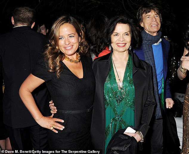 Jade Jackson with her parents, Sir Mick and his first wife Bianca Jagger, in London in 2013