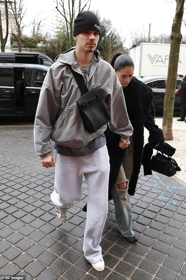 The couple held hands as they headed back to the hotel