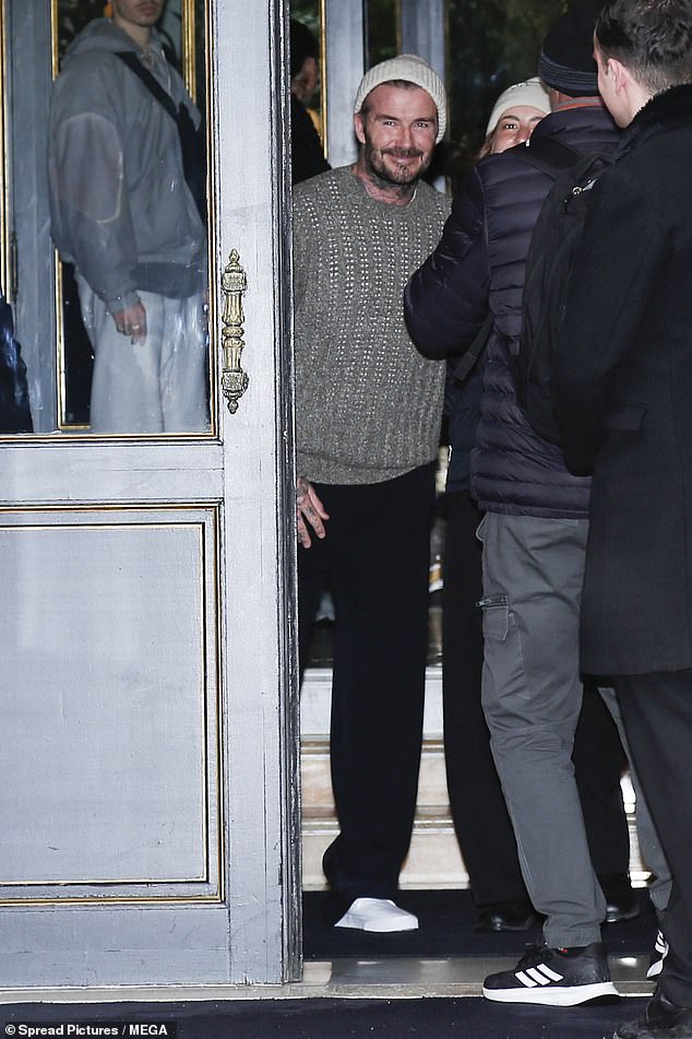 David looked in great spirits as he stepped out despite a difficult week