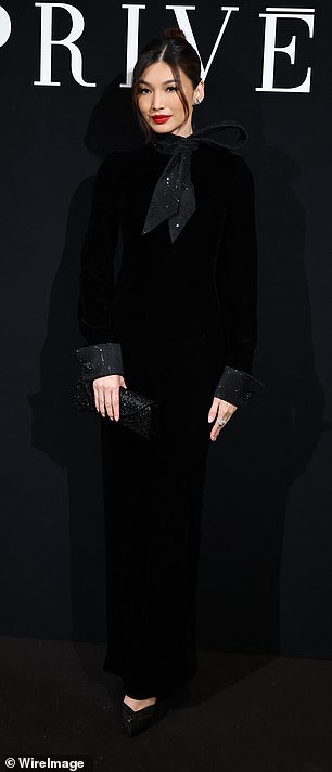 She turned heads in a high-neckline maxi-dress