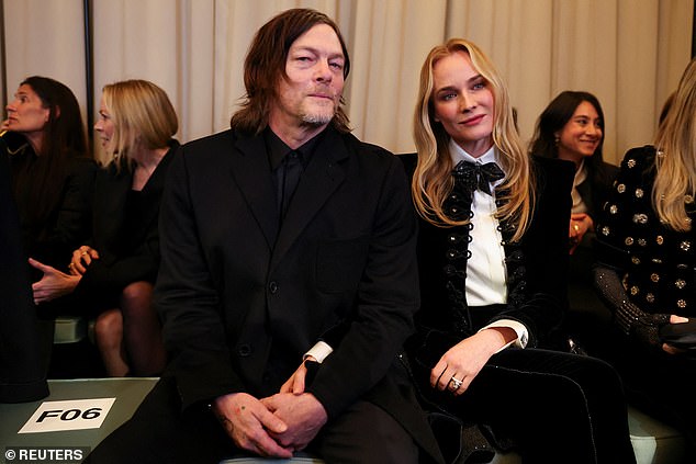 Diane's look was complete with a white shirt and velvet bowtie, as well as a pair of stilettos (Seen with Norman Reedus)