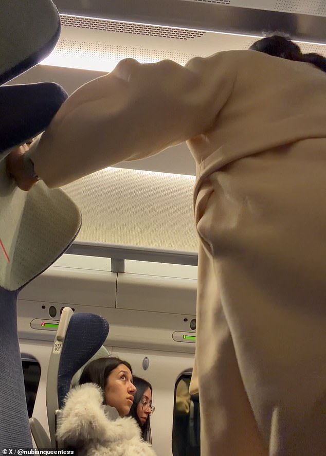 At no point did anyone else on the carriage interrupt her speech, although another female passenger sitting nearby looked at the woman before turning away