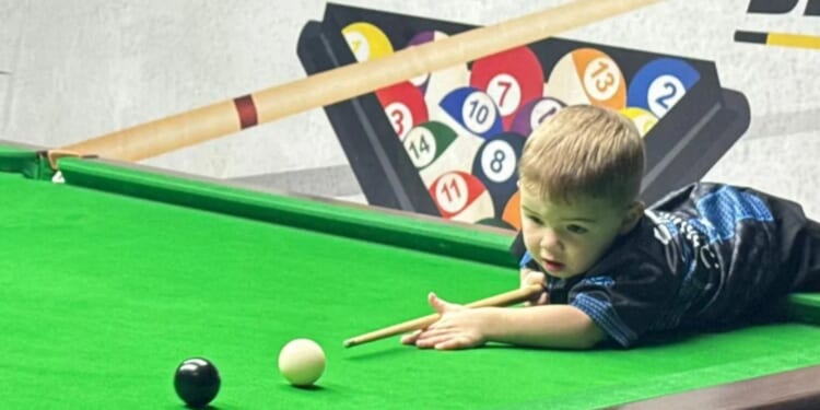 Toddler snooker wizard Jude pots two new world records after becoming youngest player ever to land trick shots