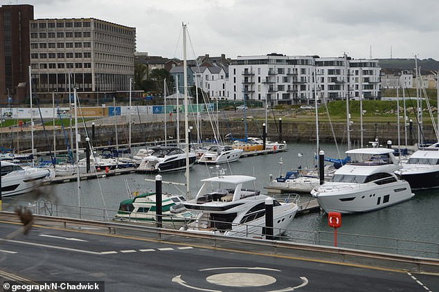 Officers recovered Mr Perham's body from the sea at Millbay Marina in Plymouth, Devon