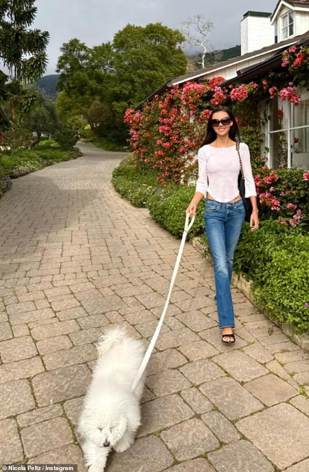 The actress beamed as she walked Lamb