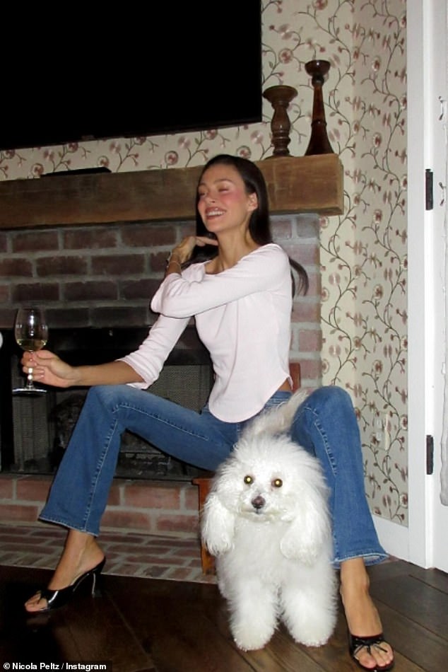 Nicola brushed off the family drama as she enjoyed a glass of wine