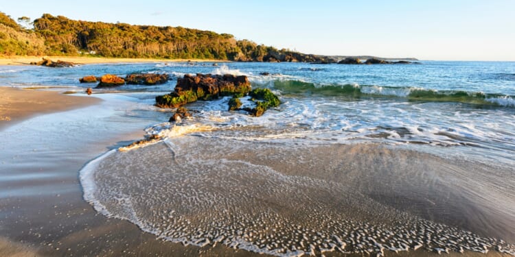 Missing Brit tourist, 23, found dead on beauty-spot tourist beach after tripping and falling off cliff
