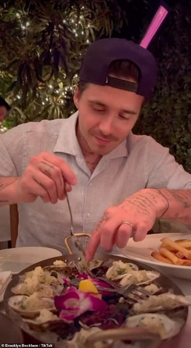 Brooklyn tucks into dinner during the couple's stay at the San Ysidro Ranch in Montecito