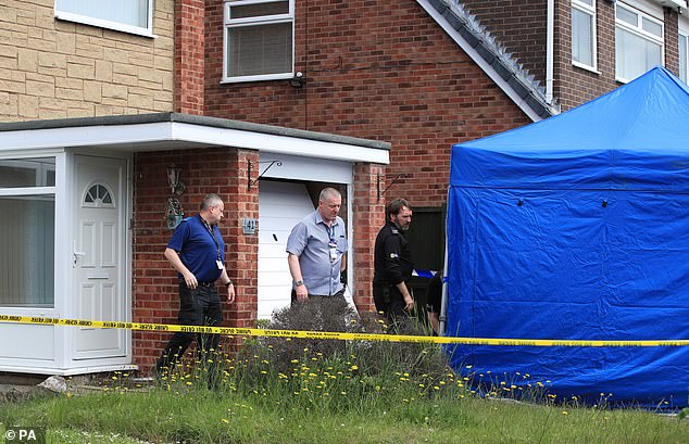 Police investigate at Lucy Letby's home in Chester in June 2019, with a tent erected outside