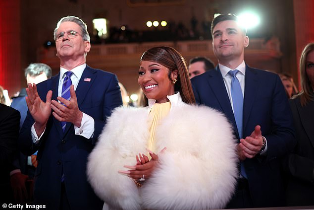 Minaj sat beside Treasury Secretary Scott Bessent (left) and Trump advisor Alex Bruesewitz (right) for the event in a frigid Washington, DC on January 28, 2026