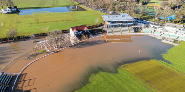 Iconic English stadium left unrecognisable as it is submerged in water after being battered by Storm Chandra