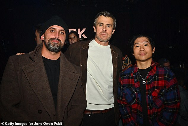 The 22-year-old nepo kid wore a red-and-black plaid shirt over a black T-shirt with a silver toy alien necklace as he posed with co-directors Fernando Ferro and Garrett Patten at a panel for their film Self Custody at The Cabin in Park City