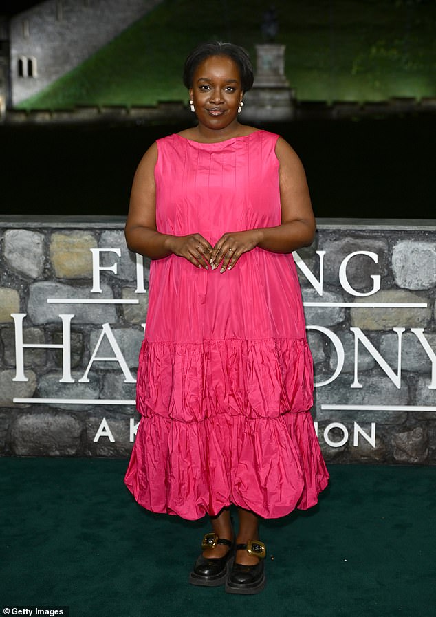 Ghosts actress Lolly Adefope turned heads in a bright pink sleeveless tiered midi-dress