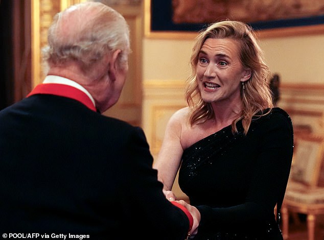 Kate looked delighted as she got to shake hands with King Charles III during the premiere on Wednesday