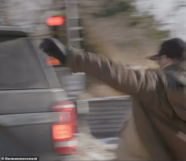 Pretti was seen spitting on a federal vehicle before kicking its taillight and causing it to fall off - triggering officers to tackle him to the ground