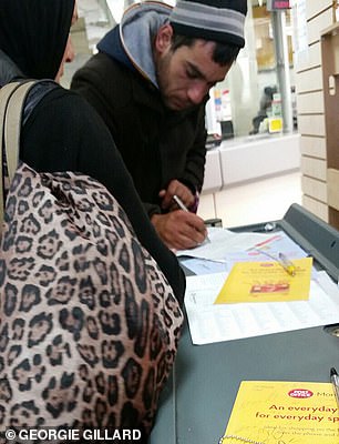 Petru Neagh is pictured sending his begging profits back home to Romania at a post office in Edgware Road, London