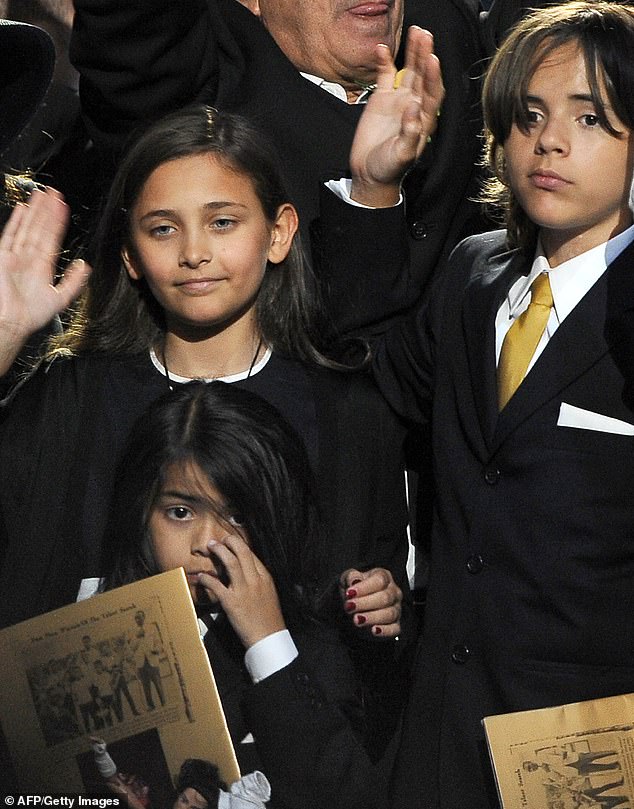Blanket, Paris and Prince and Prince Michael Jackson were pictured at their late father's July 7, 2009 memorial at Staples Center in LA