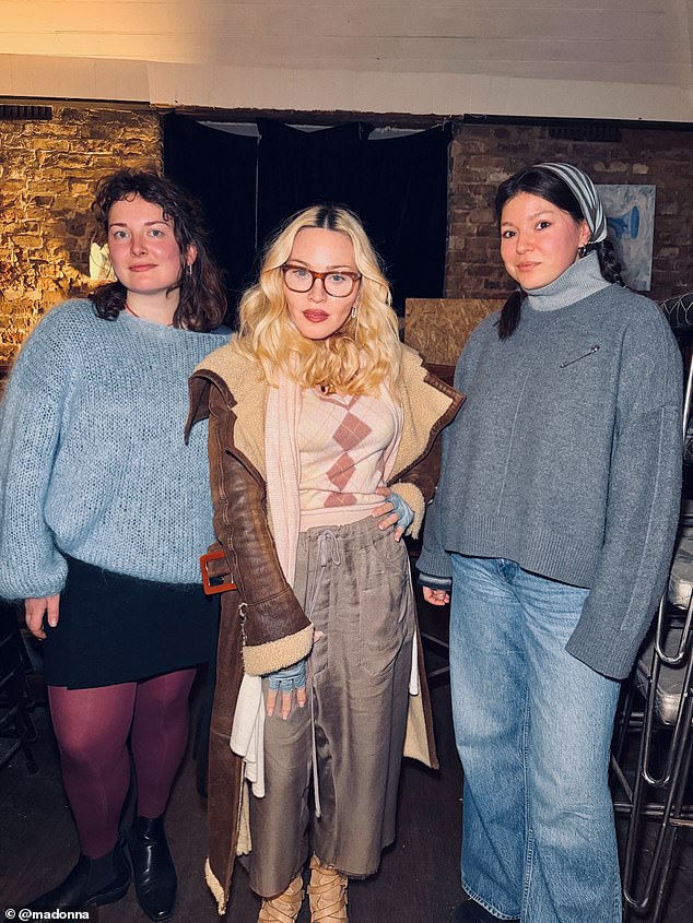 Madonna took the time to visit the artist's individual exhibitions dotted throughout the town, posing with artists Elizaveta Zalieva and Olya Avstreyh