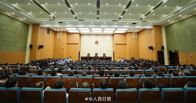 Fraud operations centred in Myanmar's border regions have extracted billions of dollars from around the world through phone and internet scams (pictured, some of the crime family at their sentencing in October at the Wenzhou Intermediate People's Court in eastern China's Zhejiang Province)