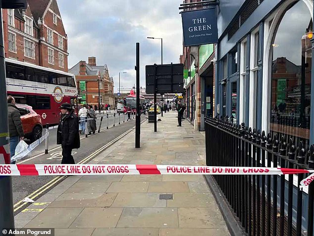 Police officers were at the scene within three minutes and were threatened with a hammer as the thieves tried to speed away on mopeds