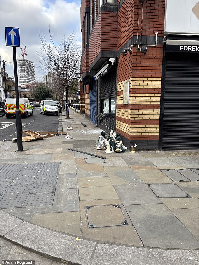 A police cordon was in place more than 12 hours after the theft while shards of broken glass and jewellery remained strewn on the floor