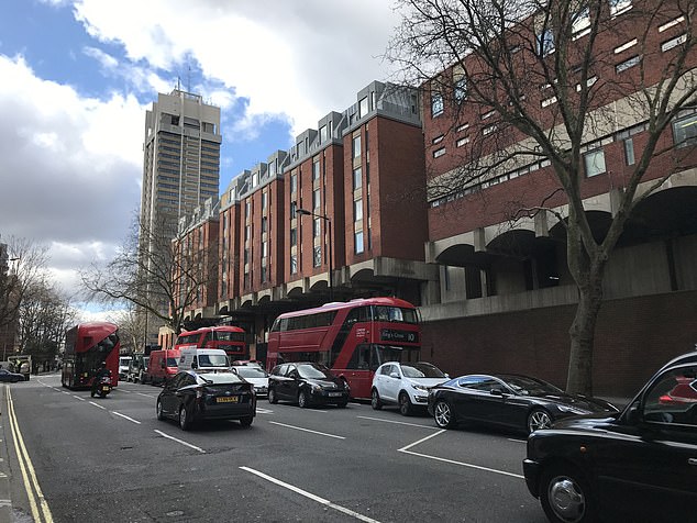 He allegedly waited until the trooper was unconscious before entering the bedroom in his flat at Hyde Park Barracks, pictured, where his partner was sleeping, and climbing on top of her