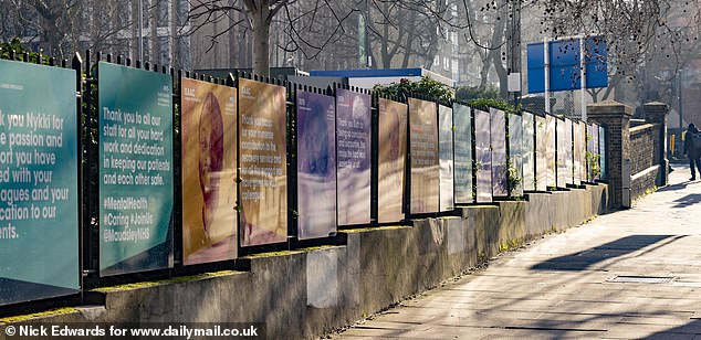 The boards stretch the 250-metre length of Denmark Hill outside King's College Hospital and Maudsley Hospital