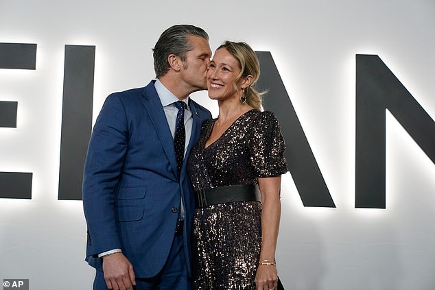 Defense Secretary Pete Hegseth planted a kiss on wife Jennifer's cheek as they arrived for Melania's movie premiere